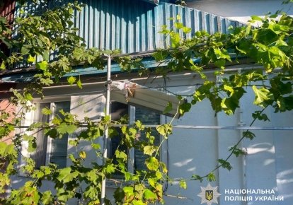 Поврежденный обстрелом дом