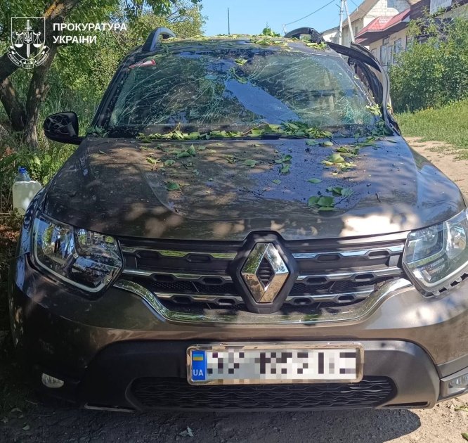 Поврежден от обстрела авто