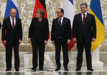 Владимир Путин, Ангела Меркель, Франсуа Олланд и Петр Порошенко во время минских переговоров 11 февраля 2015 г.
