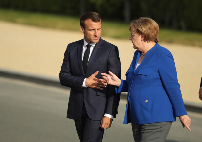 Эммануэль Макрон и Ангела Меркель / Getty Images