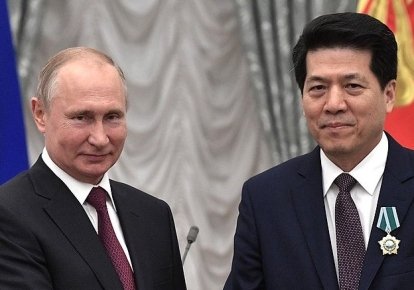 Президент РФ Владимир Путин и Ли Хуэй