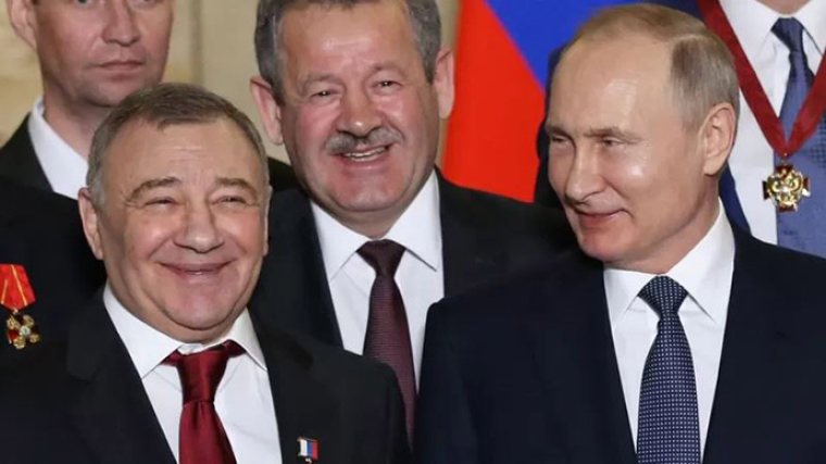 Аркадий Ротенберг и Владимир Путин в Севастополе, Getty Images