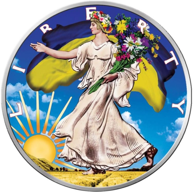 На реверсах обох монет зображена жінка, яка втілює образ Свободи